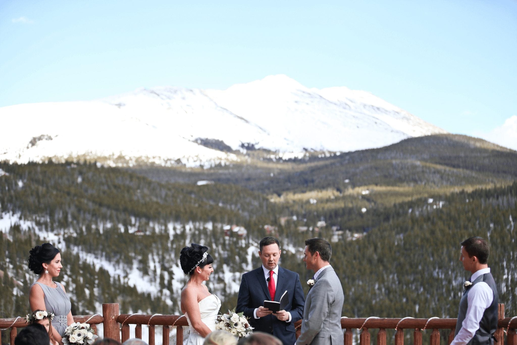Bride and Groom at Winter Wedding Ceremony in Breckenridge Mountains
