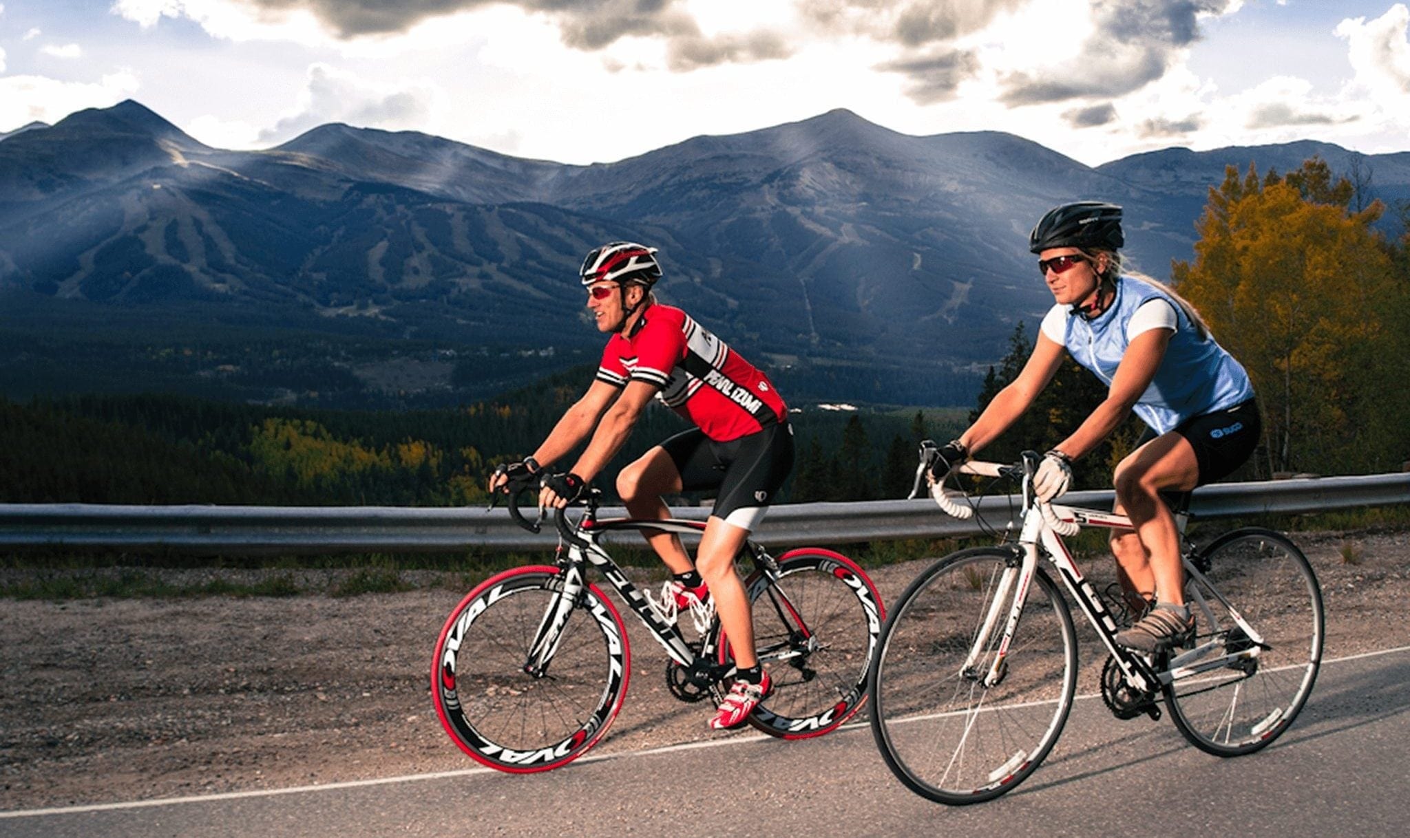 Two people road biking in Breckenridge.