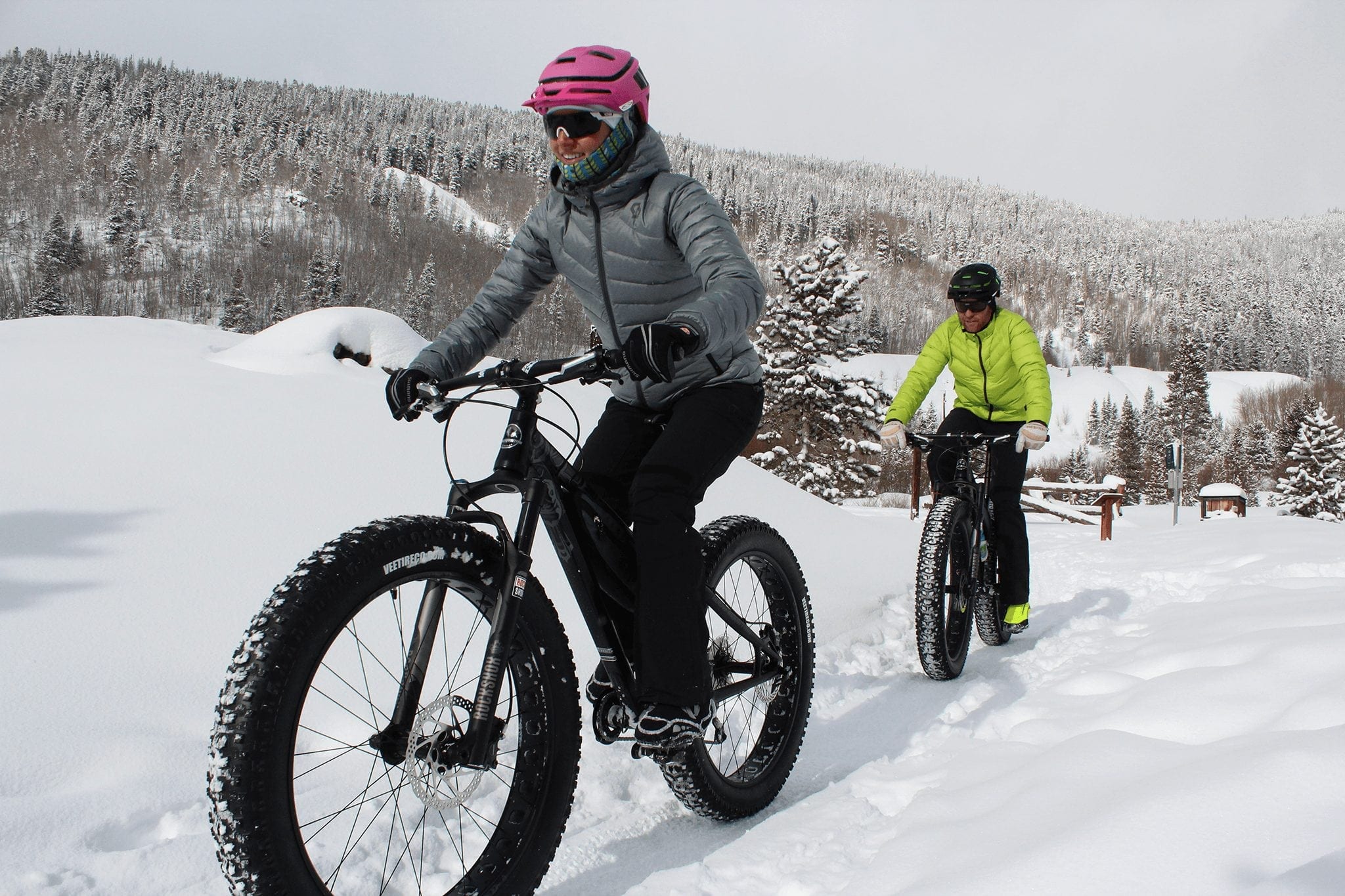 Two fat bikers on a snowy trail in Breckenridge, Colorado.