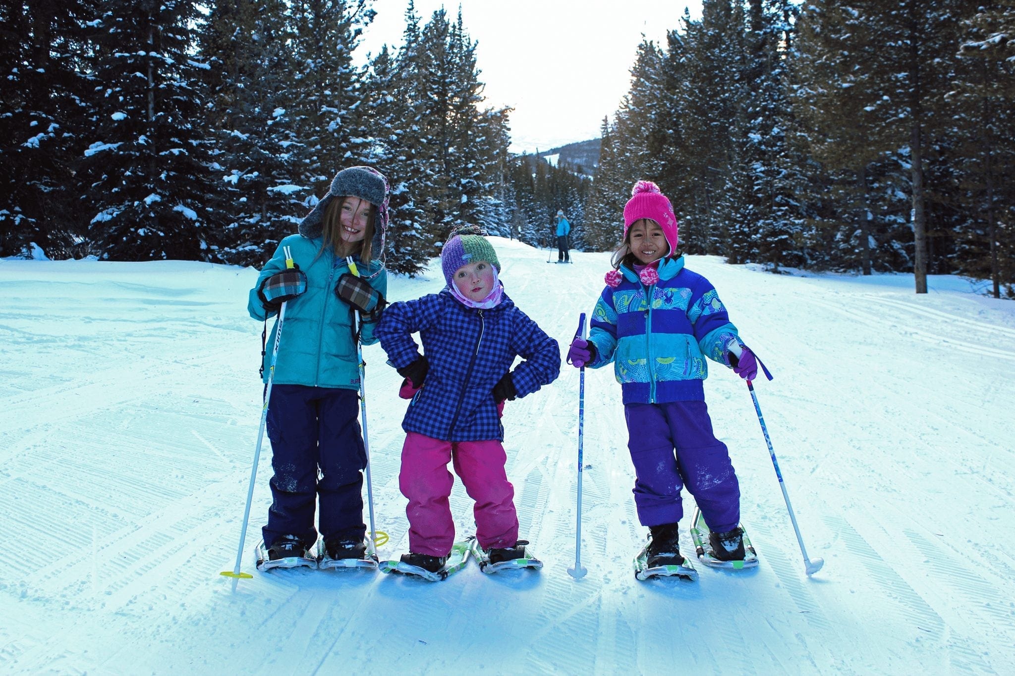 Kids smiling while snowshoeing in Breckenridge, Colorado