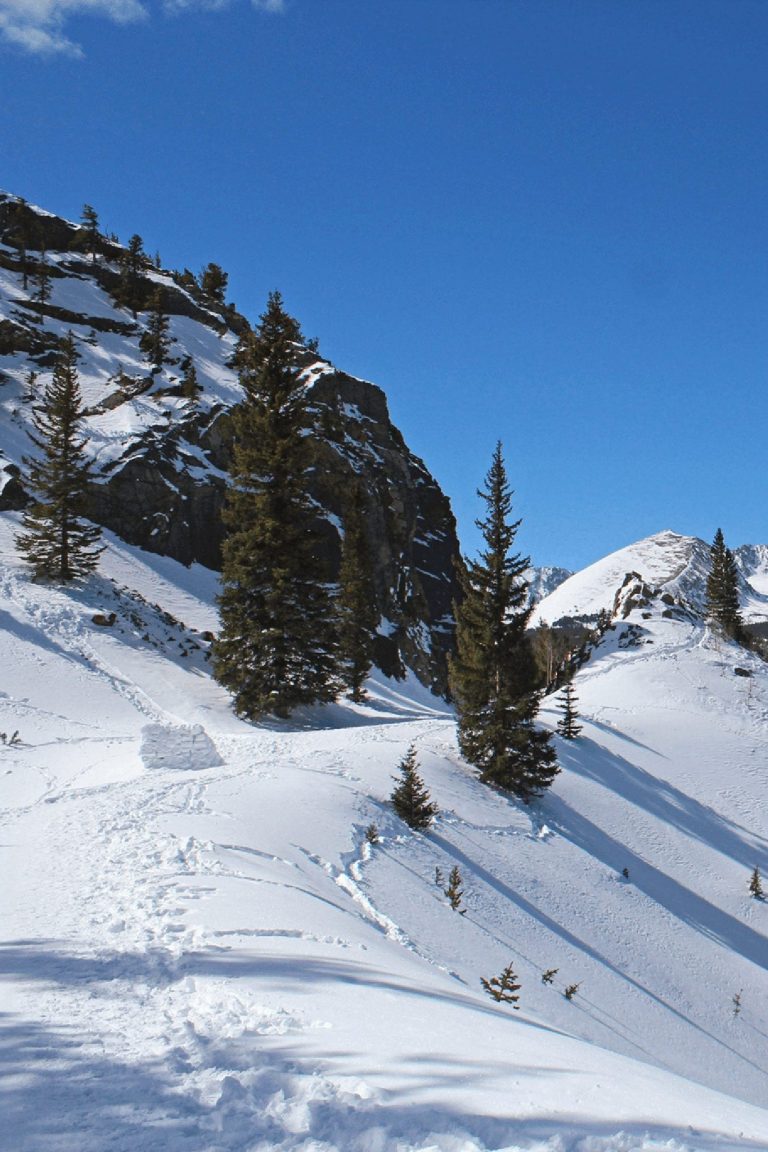 Snow-covered winter hiking trail in Breckenridge.