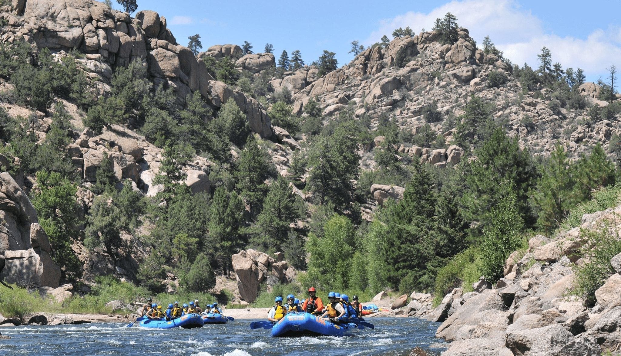 Summer group rafting in the Blue River in Breckenridge