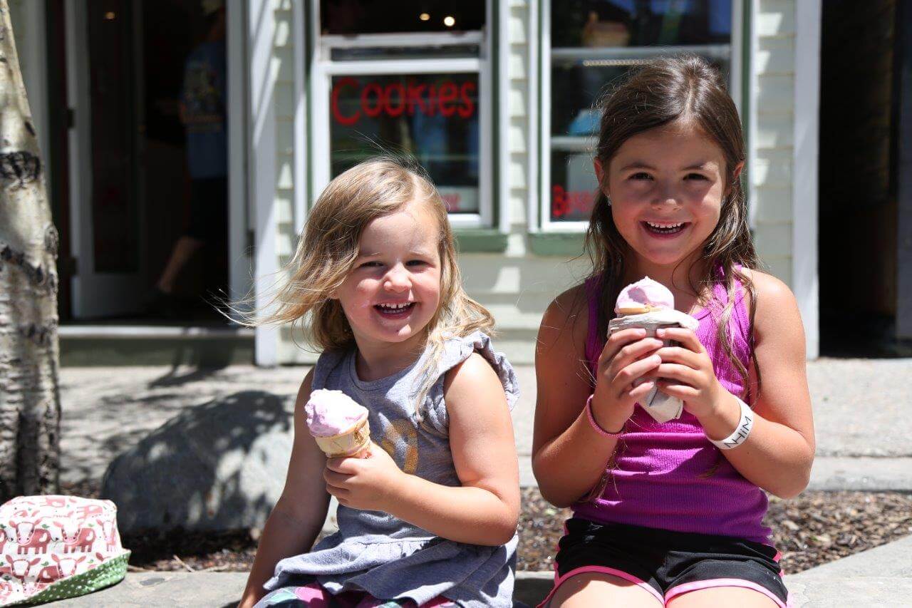 Two girls eating ice cream in Breckenridge CO