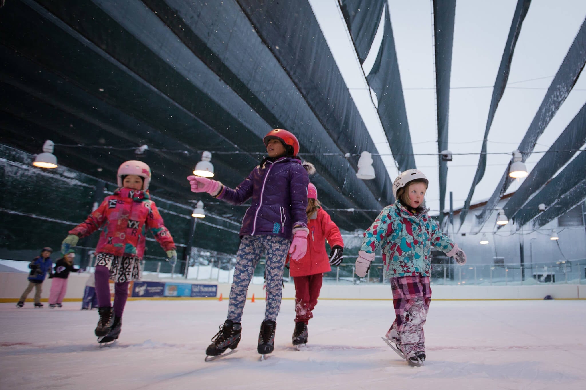 Kids ice skating at the ice arena in Breckenridge