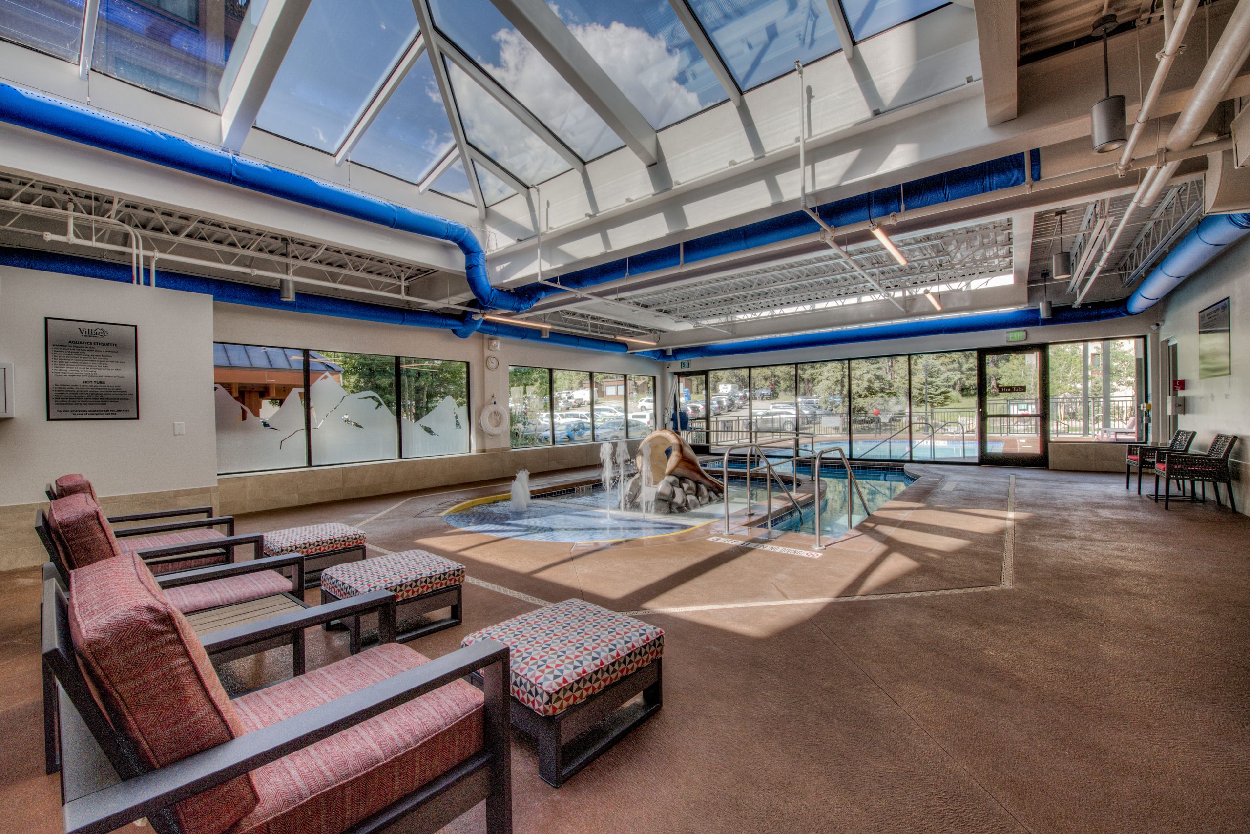 The indoor pool at The Village Breckenridge is kid friendly and is steps away from the larger outdoor pool. 