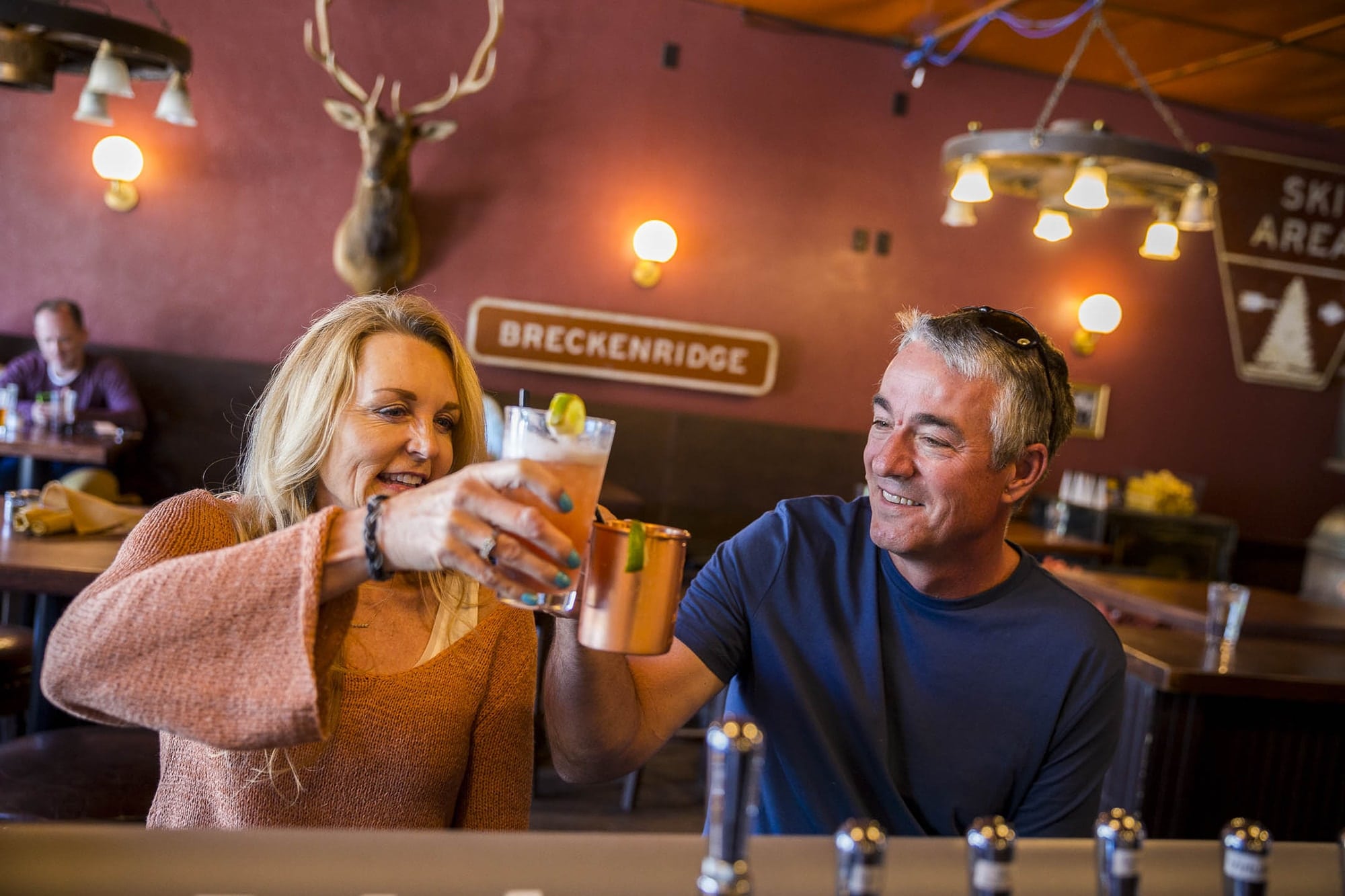 Couple cheers at Gold Pan Saloon in Breckenridge 