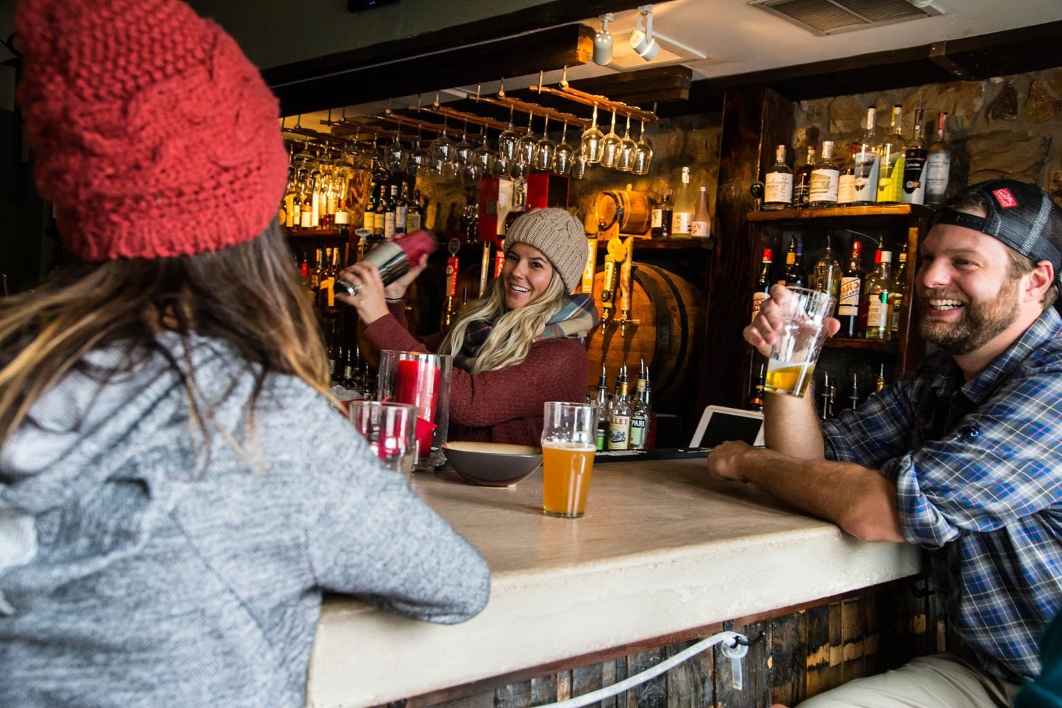 Bartender pouring drinks in Breckenridge bar