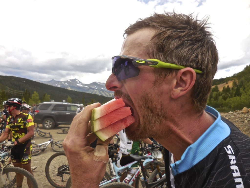 Man eating after the Breck Epic race