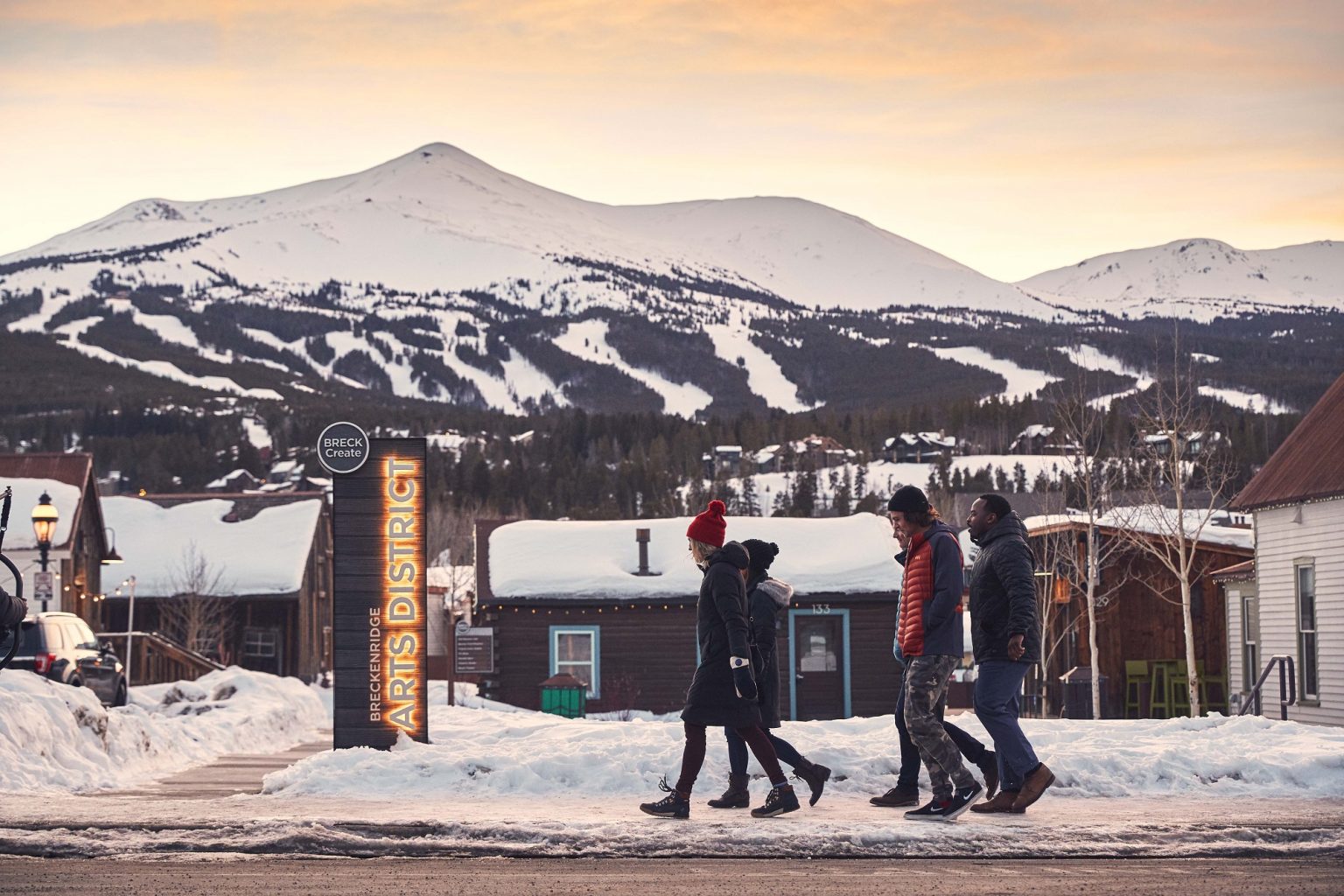 A group walking along a street during winter in Breckenridge