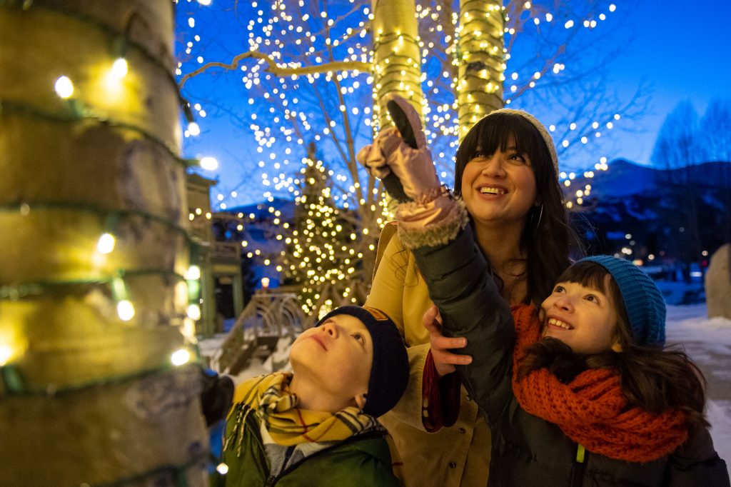 Kids pointing at the lights at Breck in the Spirit 2018