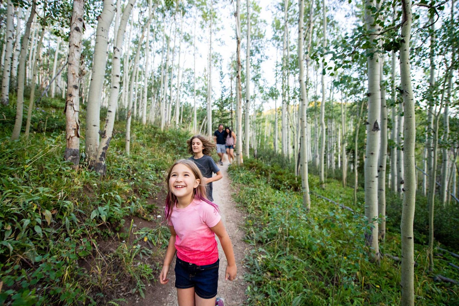 Family hiking in. Breckenridge during the summer