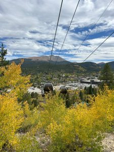 Fall colors with mountains and the gondola.